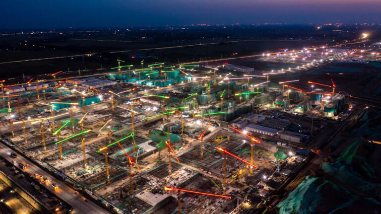 Этот китайский город — достойный ведра, мастер-планируемый эксперимент в городском совершенстве.